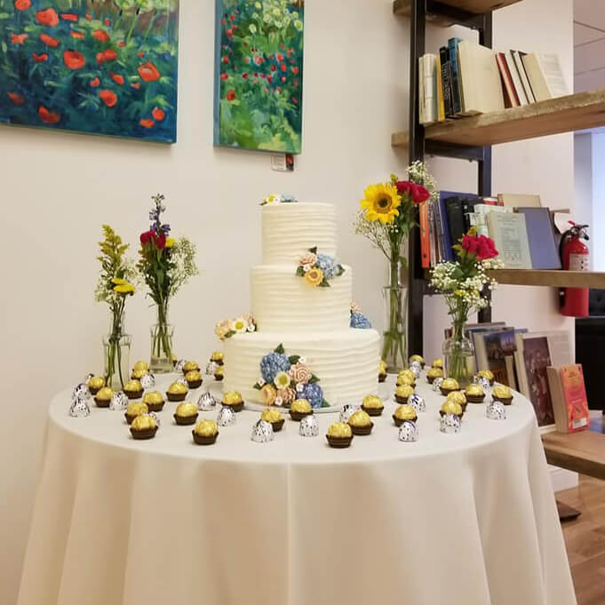 Wedding cake, sweets and flowers