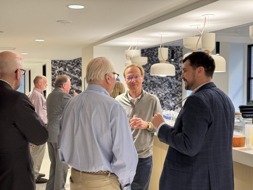 Rotary Club of Wilmington President, Lynn Jones talking to Founder of The Mill, Robert Herrera and fellow Rotarians and Mill Members